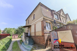 Bezczynszowe mieszkanie w centrum z działką